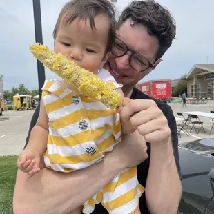 Baby loves the elote!
