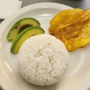 This side dish came with the soup of the day and it includes avocado slices, some plantains, rice, and cream on the side.
