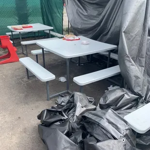 tables covered with tarps