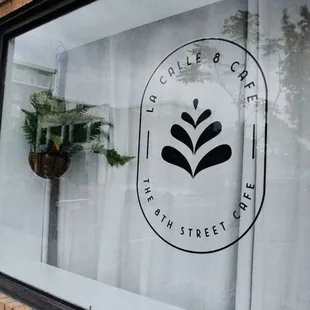 a window with a plant in it