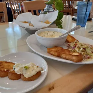 Fondue Cancun with cheese, baby clams, crab meat, scallops and shrimp served with toasted garlic bread and salad. $15.95