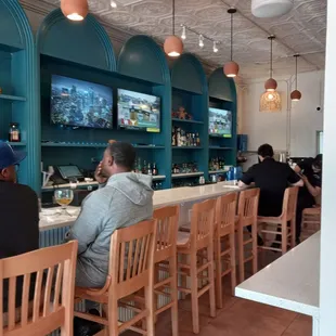 Bar at the restaurant entrance separate from the dining areas