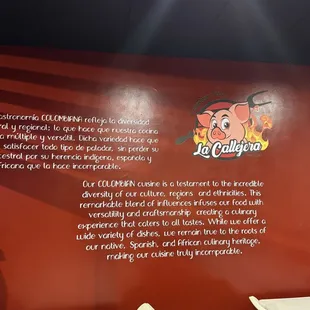 a restaurant with a red wall