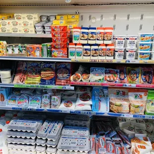 a shelf of dairy products