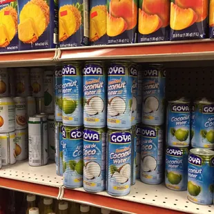 a variety of beverages on a shelf