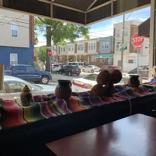 a view of a street through a window