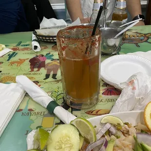 a plate of food and a drink on a table