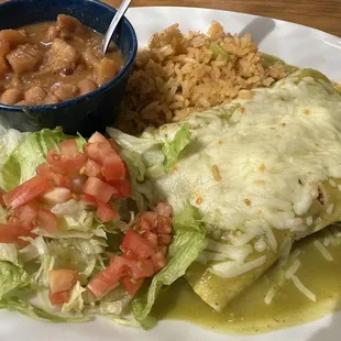 Chicken Enchiladas Verdes, rice &amp; charro beans.