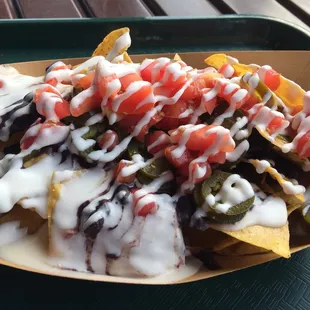 Secret menu item: Vegetarian Nachos - ask cashier to take off beef and beans and add black beans.