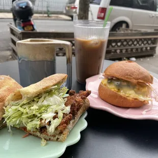 Chicken cutlet special sandwich and egg, cheese, and poblano sandwich. Drip coffee and cold brew