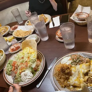 Shrimp fajita tostada, carnitas enchiladas, and menudo