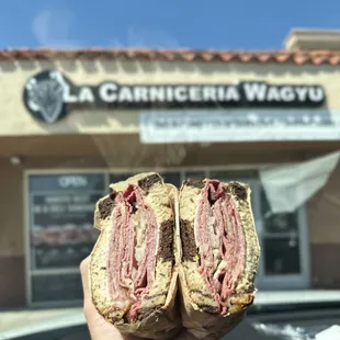 SMOKED WAGYU PASTRAMI: Whole Grain Island Dressing, Sauerkraut, Smoked Mozzarella, Pig Onion Marmalade, Marble Rye | $23