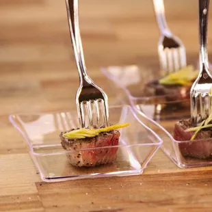 a fork and a piece of meat