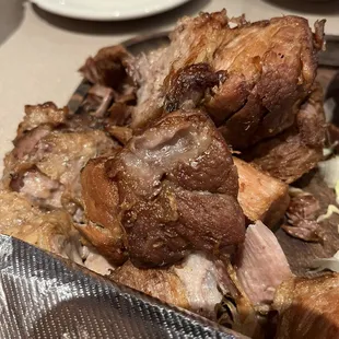 a plate of meat on a table