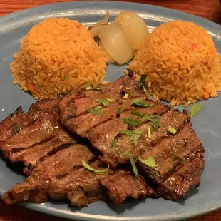 Sirloin steak with onions and extra rice