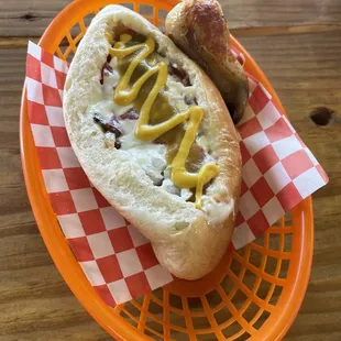 a hot dog with mustard and ketchup