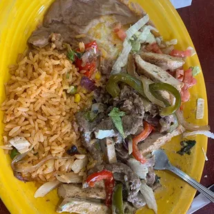 a yellow plate of mexican food