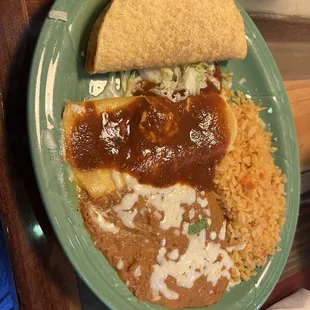 Taco, cheese enchilada, rice and beans