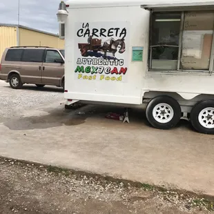 a food truck parked in a parking lot