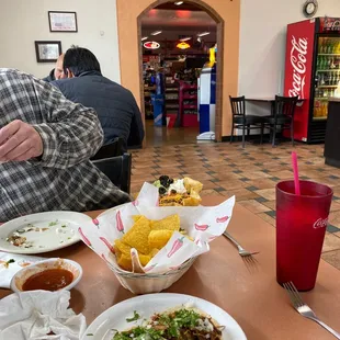 Carnitas Tacos and Taco Salad. Entry to the gas station store.