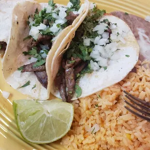 My tacos, rice, and beans. The beans were good!