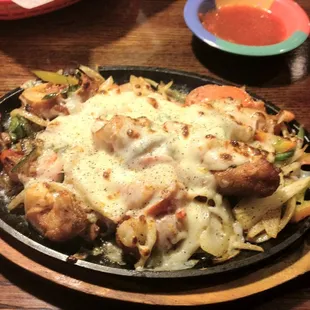 Cammarones Rancheros. Bacon wrapped shrimp