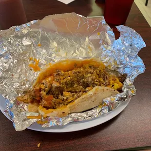 Corn tortilla chorizo egg and cheese taco