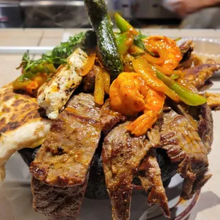 Molcajete served with rice and beans