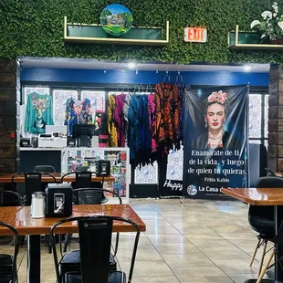 Inside the restaurant and they sell those shawls.