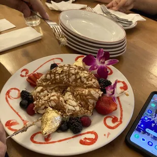 a plate of food with fruit on it
