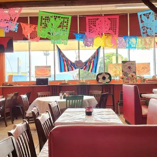 tables and chairs in a mexican restaurant