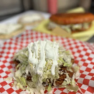 Tostada de tinga (shredded chicken with chipotle marinate tostada)