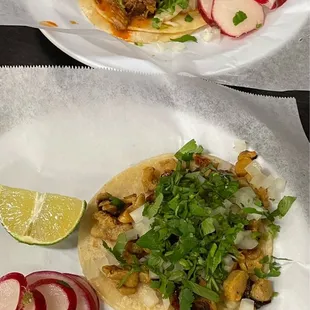 Top: birria street taco.  Bottom: chicken street taco