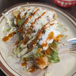 Fried quesadilla. It's delicious. Just order it. With birria preferably.