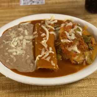 Beans, shredded beef enchilada and chille relleno.