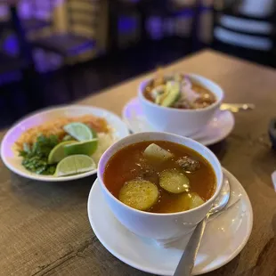 two bowls of soup on a table