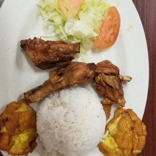 The pollo frito with white rice, good portion, salad and it comes with beans