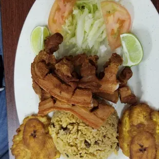 Carne frita con tostones, also comes with 2 pieces of tostones, noticed the same meat is used for bandeja paisa.