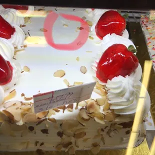 Cake with visible hair on frosting.