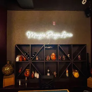 a bar with a neon sign