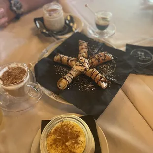 Tiramisu, Cannoli, Pannacotta cappuccino, cappuccino, and espresso!! All so good