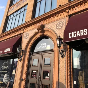 the entrance to a cigar shop