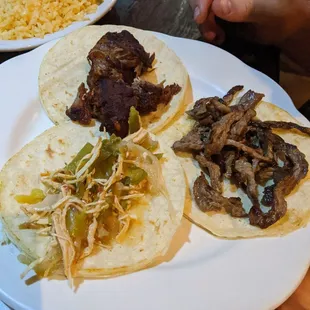 Trio of tacos with rice