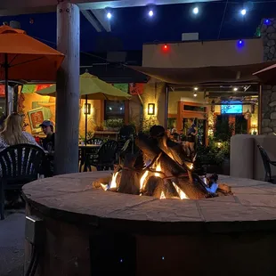 Enjoying an awesome summer night at Casa Fiesta by the light of the fire.