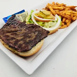 a steak sandwich and french fries