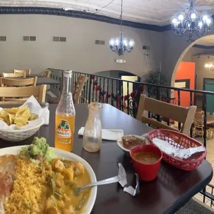 Shrimp dinner with a side of Diablo sauce.