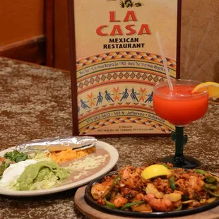 two plates of food and a drink