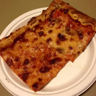 Four-cheese and sausage. Two slices for $5.