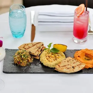 a plate of food and drinks