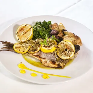 Grilled Branzino Roasted potatoes, green kale, lemon-oregano vinaigrette.
